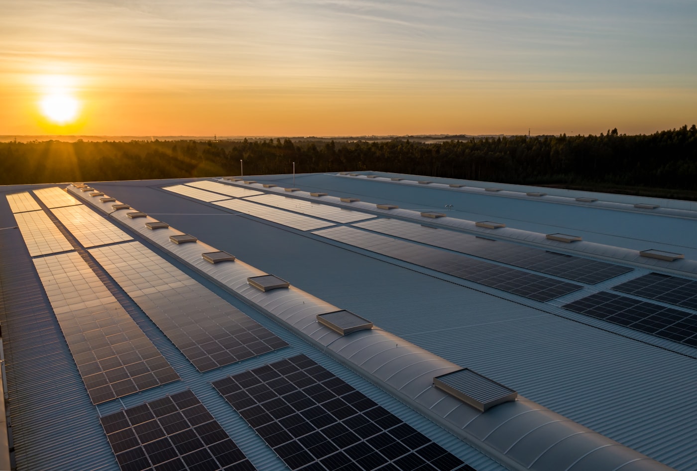 Rooftop solar panels being cleaned under the Arizona sun